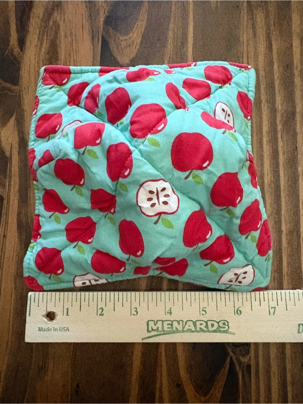 Quilted bowl cozy in classic Apple print with teal background cottagecore